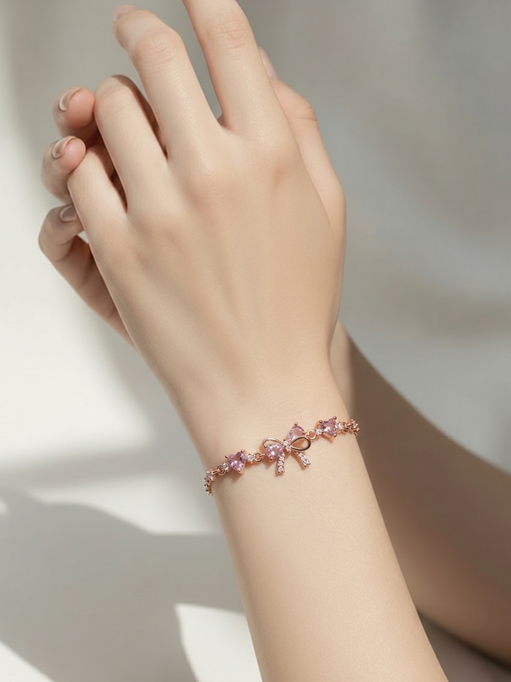 Silver Tone Pink Crystal Bow Bracelet -hypo allergenic gold plated
